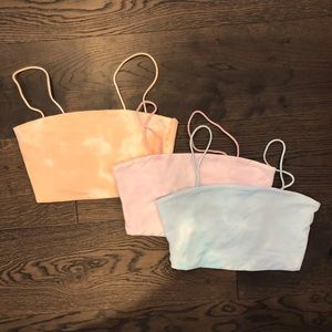 Bundle of tie dyed crop tops.